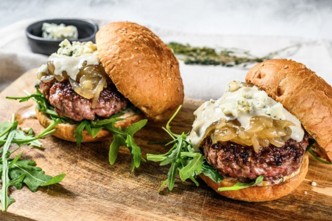 Bruschetta Burger with Caramelized Onions and Blue Cheese